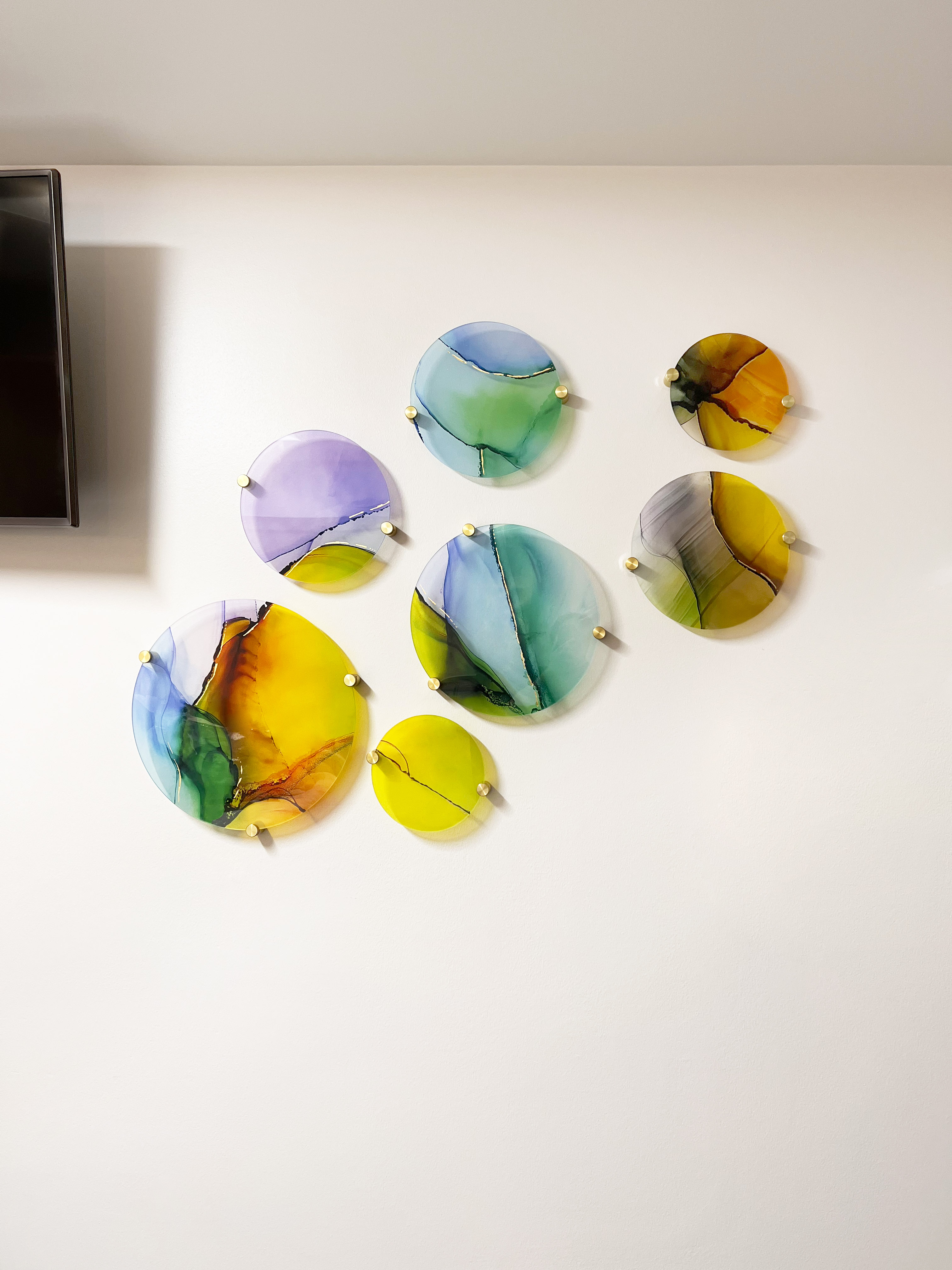 Glass circles mounted on wall